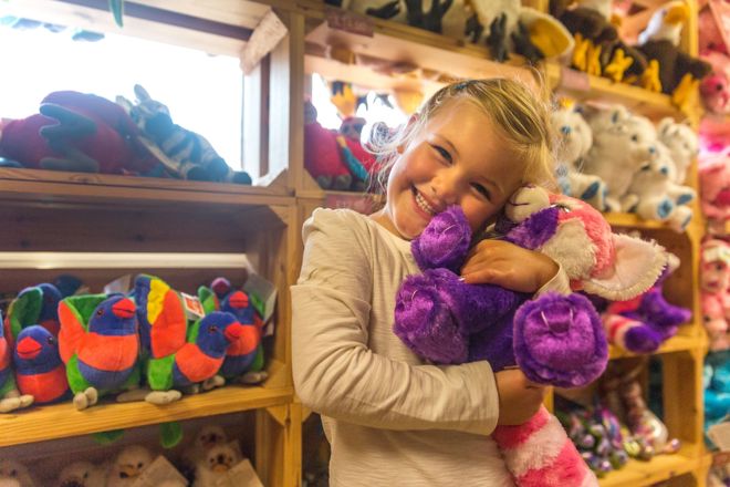 Image of child in junglies gift shop